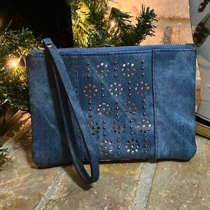 Francesca’s denim blue laser cut wristlet/wallet